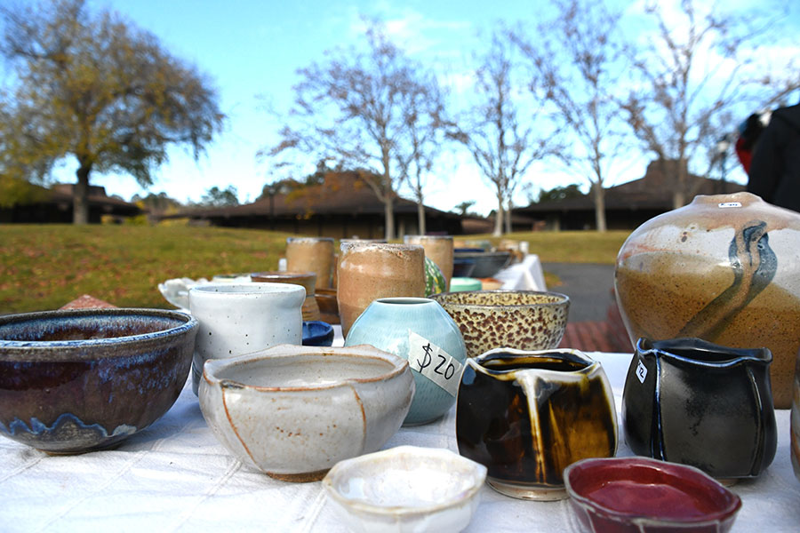 Table outside with 20 ceramics pieces