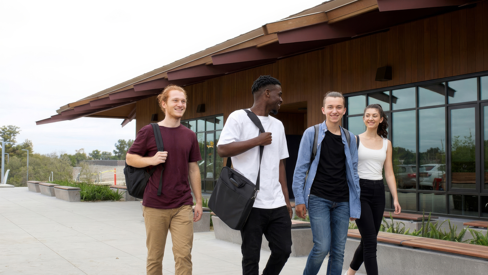 Diverse group of students walking around campus