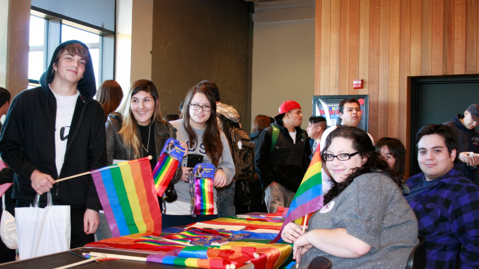 Diverse groupd of students at the Pride Table during Day Club