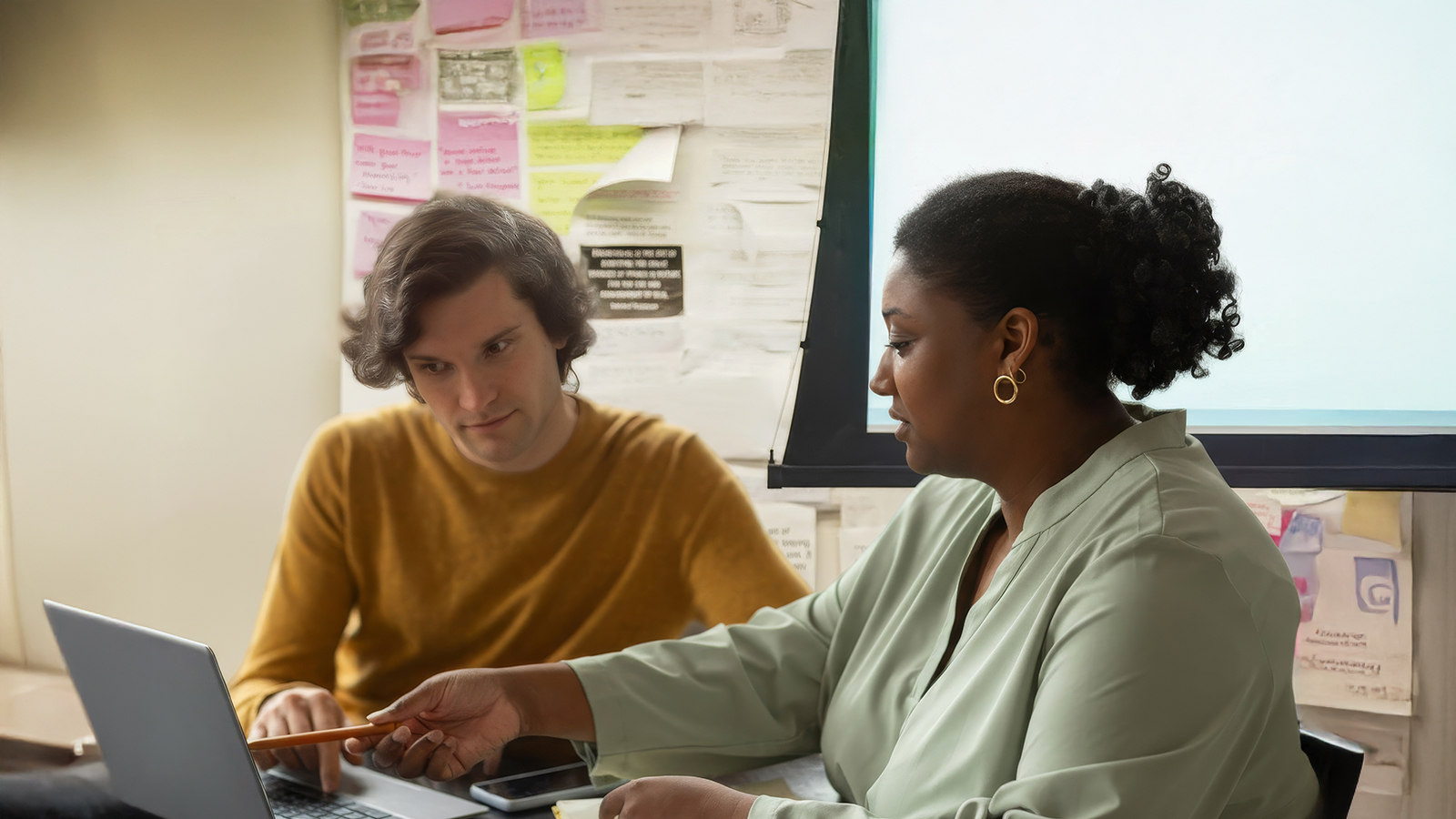 Teacher and College student in a tutoring session